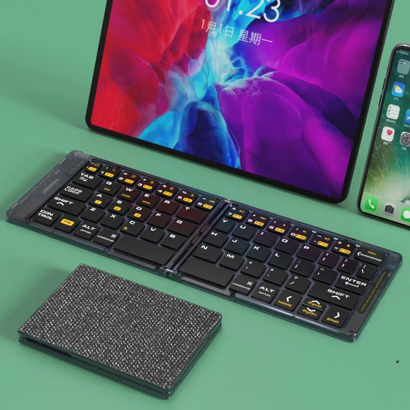 Portable wireless Bluetooth folding keyboard with 65 keys suitable for iPad laptops tablets small keyboards